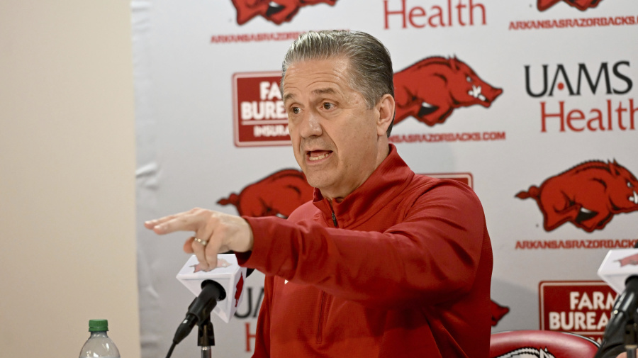 Associated Press - John Calipari answers questions from reporters during a press conference after being introduced as the new Arkansas head basketball coach Wednesday, April 10, 2024, in Fayetteville, Ark. (AP Photo/Michael Woods)