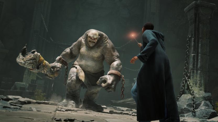 Gameplay still from 'Hogwarts Legacy,' featuring a wizarding student battling a troll