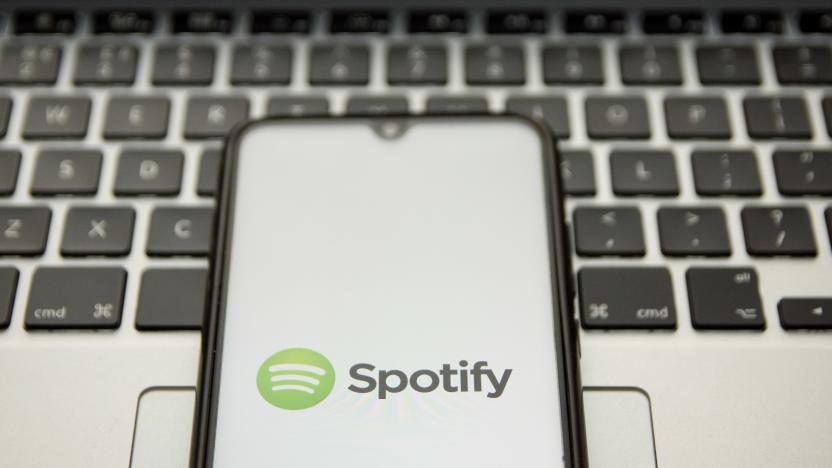 In this photo illustration a Spotify logo seen displayed on a smartphone screen with a computer keyword in the background in Athens, Greece on January 18, 2022. ( (Photo illustration by Nikolas Kokovlis/NurPhoto via Getty Images)