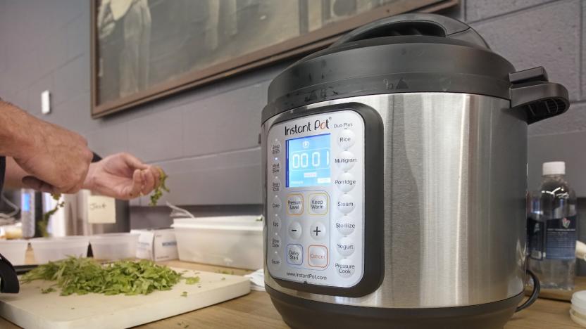 SOUTH PORTLAND, ME - JANUARY 23: With one minute left on the Instant Pot cooking ingredients for Mexican Street Tacos, Nick Verdisco, executive chef at Bolster, Snow & Co. prepares toppings for the tacos, his entry in the Instant Pot Super Bowl Cookoff at the Portland Press Herald cafeteria in South Portland on Tuesday, January 24, 2018. (Staff Photo by Gregory Rec/Portland Portland Press Herald via Getty Images)