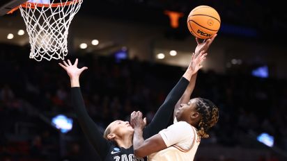Getty Images - PORTLAND, OREGON - MARCH 29: DeYona Gaston #5 of the Texas Longhorns goes for a layup while Eliza Hollingsworth #12 of the Gonzaga Bulldogs defends during the Sweet Sixteen round of the 2024 NCAA Women's Basketball Tournament held at the Moda Center on March 29, 2024 in Portland, Oregon. (Photo by Tyler Schank/NCAA Photos via Getty Images)