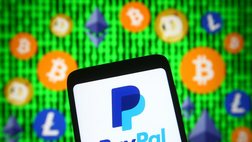 UKRAINE - 2021/04/30: In this photo illustration, PayPal logo is seen displayed on a smartphone screen in front of cryptocurrency signs. (Photo Illustration by Pavlo Gonchar/SOPA Images/LightRocket via Getty Images)