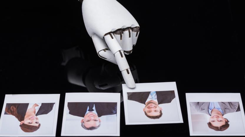 Close-up Of A Robot's Hand Selecting Candidate Photograph