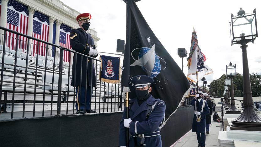 WASHINGTON, DC - JANUARY 18: A member of the Air Force holds a Space Force flag in an honor guard during a dress rehearsal for the 59th inaugural ceremony for President-elect Joe Biden and Vice President-elect Kamala Harris at the U.S. Capitol on January 18, 2021 in Washington, DC.  Biden will be sworn-in as the 46th president on January 20th. (Photo by Greg Nash - Pool/Getty Images)