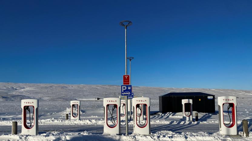 Tesla electric vehicles chargers are seen in a petrol station on King road during the winter in Staour, Iceland February 12, 2022. Picture taken February 12, 2022. REUTERS/Nacho Doce