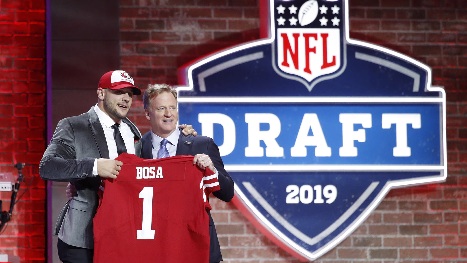 Ohio State defensive end Nick Bosa poses with his new team jersey after the  San Francisco 49ers selected Bosa in the first round at the NFL football  draft, Thursday, April 25, 2019