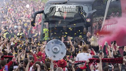 Associated Press - The team bus of Bayer Leverkusen is welcomed by thousands of supporters at the stadium ahead of the German Bundesliga soccer match between Bayer Leverkusen and Werder Bremen in Leverkusen, Germany, Sunday, April 14, 2024. Leverkusen could win the Bundesliga title if they win the match against Bremen.(AP Photo/Martin Meissner)