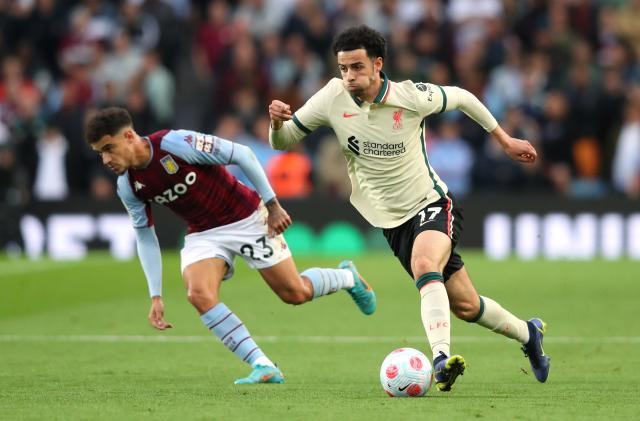 BIRMINGHAM, ENGLAND - MAY 10: Curtis Jones of Liverpool beats Philippe Coutinho of Aston Villa during the Premier League match between Aston Villa and Liverpool at Villa Park on May 10, 2022 in Birmingham, England. (Photo by Alex Livesey - Danehouse/Getty Images)