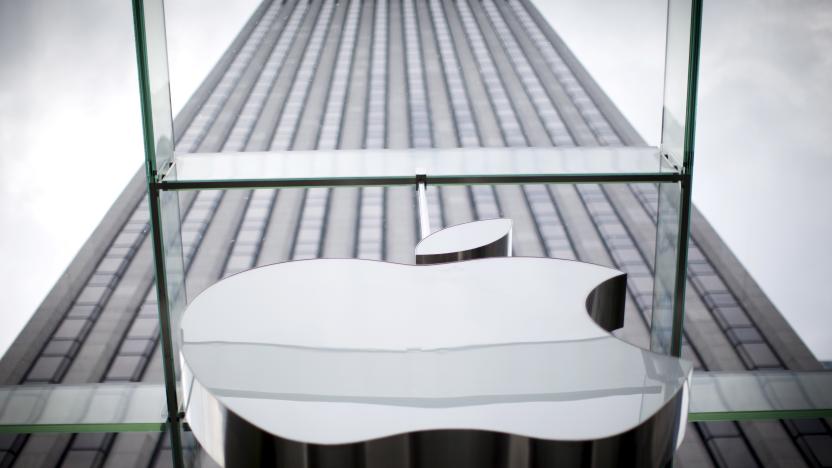 An Apple logo hangs above the entrance to the Apple store on 5th Avenue in the Manhattan borough of New York City, July 21, 2015. Apple Inc said it is experiencing some issues with its App Store, Apple Music, iTunes Store and some other services. The company did not provide details but said only some users were affected. Checks by Reuters on several Apple sites in Asia, Europe and North and South America all showed issues with the services. REUTERS/Mike Segar