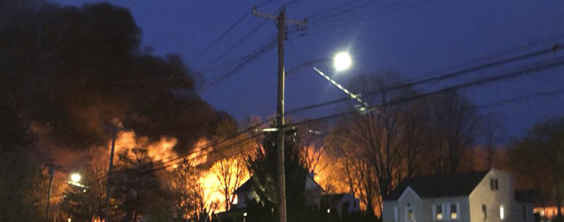 A woman's domestic violence call leads to a deadly explosion in North Haven, Conn. (Kevin Galliford/WFSB-TV via AP)