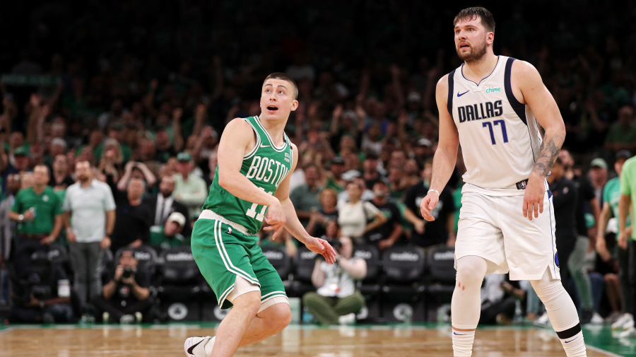 Getty Images - BOSTON, MASSACHUSETTS - JUNE 17: Payton Pritchard #11 of the Boston Celtics and Luka Doncic #77 of the Dallas Mavericks watch Pritchard's half court buzzer beating shot during the second quarter of Game Five of the 2024 NBA Finals at TD Garden on June 17, 2024 in Boston, Massachusetts. NOTE TO USER: User expressly acknowledges and agrees that, by downloading and or using this photograph, User is consenting to the terms and conditions of the Getty Images License Agreement. (Photo by Elsa/Getty Images)