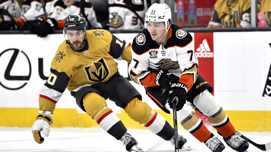 Associated Press - Anaheim Ducks right wing Frank Vatrano (77) handles the puck next to Vegas Golden Knights center Nicolas Roy (10) during the second period of an NHL hockey game Thursday, April 18, 2024, in Las Vegas. (AP Photo/David Becker)