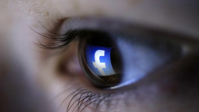 A picture illustration shows a Facebook logo reflected in a person's eye, in Zenica, March 13, 2015. Facebook Inc recorded a slight increase in government requests for account data in the second half of 2014, according to its Global Government Requests Report, which includes information about content removal.Requests for account data increased to 35,051 in the second half of 2014 from 34,946 in the first half, with requests from countries such as India rising and those from others including United States and Germany falling, the report by the world's largest Internet social network showed. Facebook said it restricted 9,707 pieces of content for violating local laws, 11 percent more than in the first half, with access restricted to 5,832 pieces in India and 3,624 in Turkey. Picture taken on March 13. REUTERS/Dado Ruvic (BOSNIA AND HERZEGOVINA - Tags: SOCIETY PORTRAIT SCIENCE TECHNOLOGY BUSINESS TELECOMS TPX IMAGES OF THE DAY)