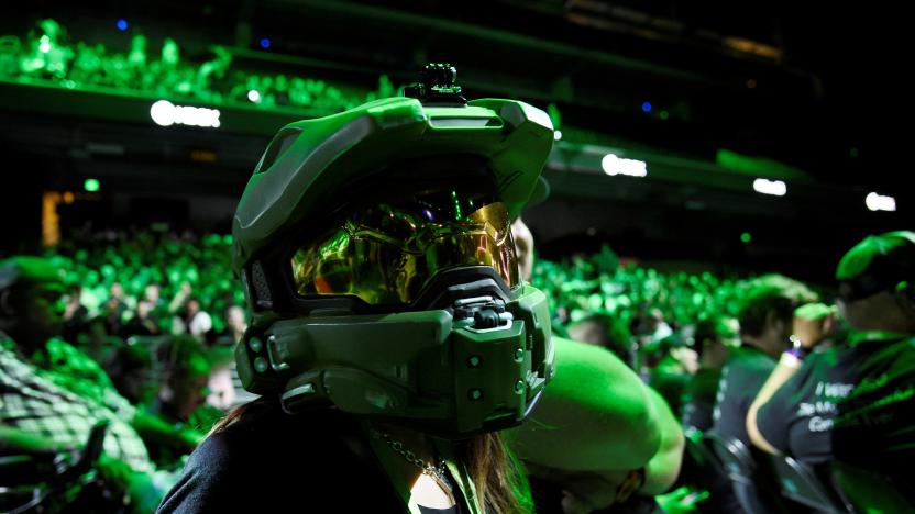 An attendee wearing a Halo Master Chief helmet waits for the Microsoft Xbox E3 2017 media briefing in Los Angeles, California, U.S., June 11, 2017. 