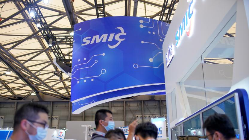 People visit a booth of Semiconductor Manufacturing International Corporation (SMIC), at China International Semiconductor Expo (IC China 2020) following the coronavirus disease (COVID-19) outbreak in Shanghai, China October 14, 2020. REUTERS/Aly Song