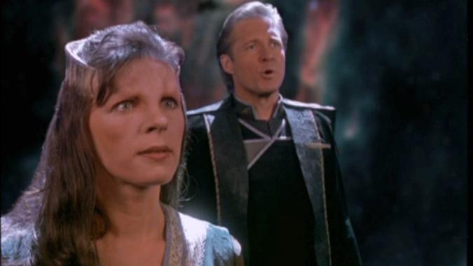 A still image from the Babylon 5 TV series showing two characters staring ahead into the distance.