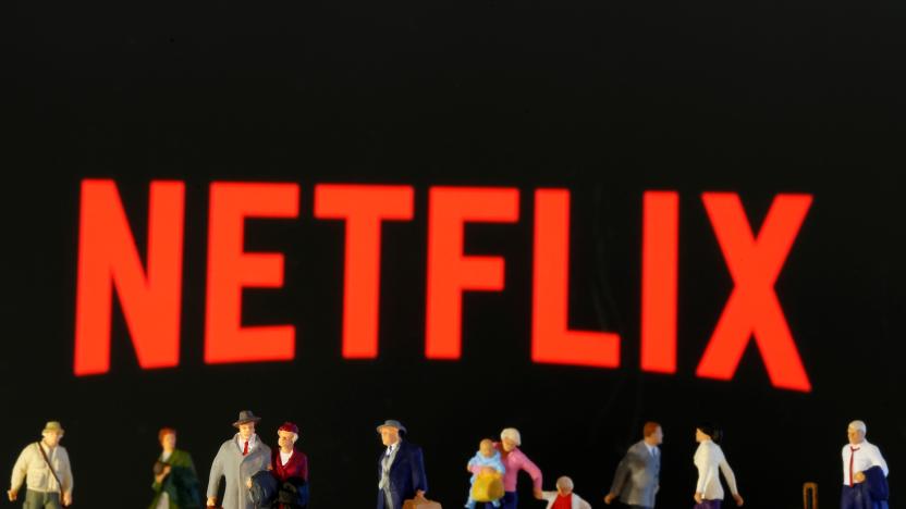 Small toy figures are seen in front of diplayed Netflix logo in this illustration taken March 19, 2020. REUTERS/Dado Ruvic/Illustration