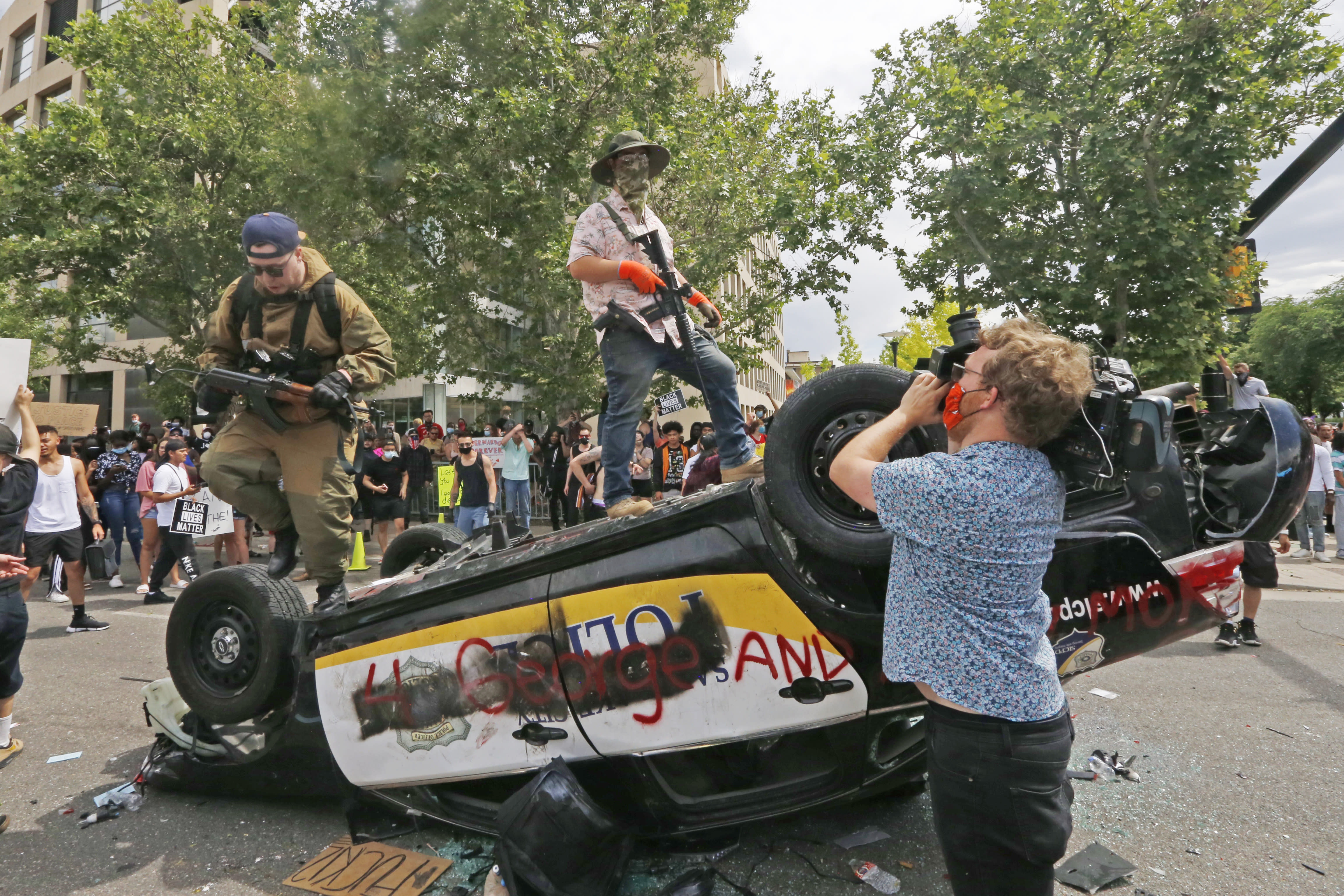 The Latest One dead in Indianapolis shootings amid protests