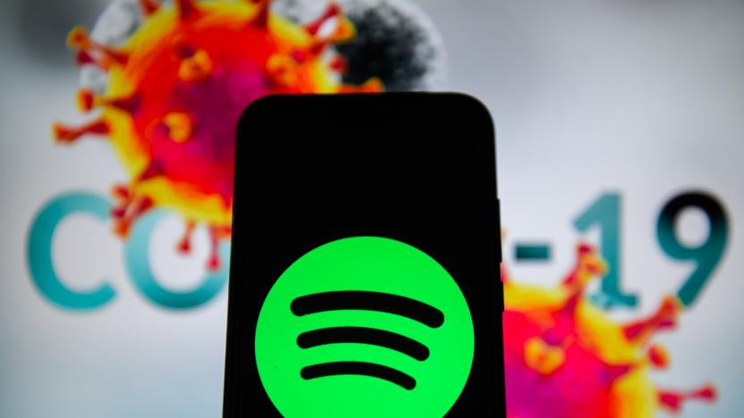 POLAND - 2020/04/10: In this photo illustration a Spotify logo  is seen displayed on a smartphone with a  COVID 19 sample on the background. (Photo Illustration by Omar Marques/SOPA Images/LightRocket via Getty Images)