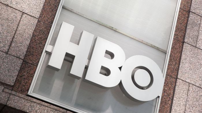 Manhattan, New York USA - July 9, 2011: HBO logo on the HBO Building in New York City, across the street from Bryant Park. HBO is a premium cable specialty channel and is owned by Time Warner.