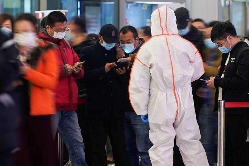 Shanghai cuts tourism, eastern Chinese city limits transport on resurgent COVID