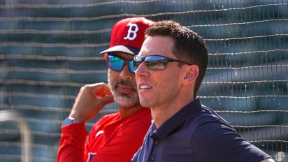 Getty Images - Fort Myers, FL - February 16: Boston Red Sox manager Alex Cora and Chief Baseball Officer Craig Breslow watch live batting practice. (Photo by Barry Chin/The Boston Globe via Getty Images)