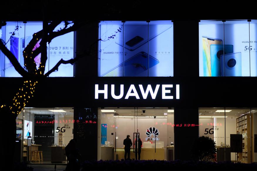 Shanghai/China-April 2020: Facade of HUAWEI flagship store at night. A Chinese Electronic brand