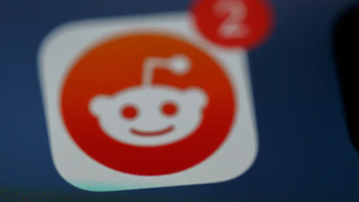 An image of Reddit logo.