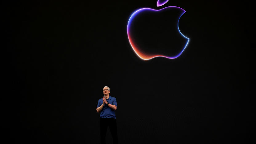 FILE PHOTO: Apple CEO Tim Cook attends the annual developer conference event at the company's headquarters in Cupertino, California, U.S., June 10, 2024. REUTERS/Carlos Barria/File Photo