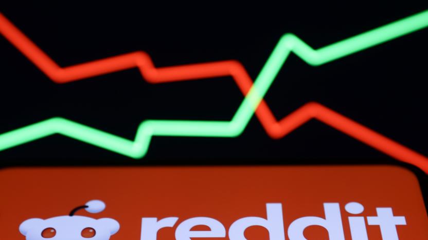 An illustrative stock graph and Reddit logo displayed on a phone screen are seen in this illustration photo taken in Krakow, Poland on February 22, 2024. (Photo by Jakub Porzycki/NurPhoto via Getty Images)