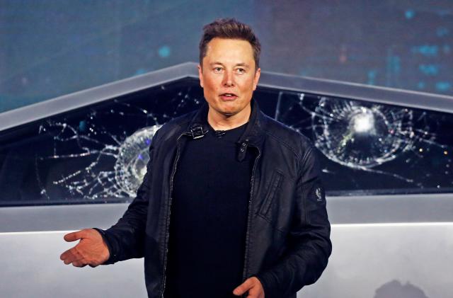 FILE - Tesla CEO Elon Musk introduces the Cybertruck at Tesla's design studio in Hawthorne, Calif., on Nov. 21, 2019. Many people are puzzled on what a Elon Musk takeover of Twitter would mean for the company and even whether he’ll go through with the deal. If the 50-year-old Musk’s gambit has made anything clear it’s that he thrives on contradiction.