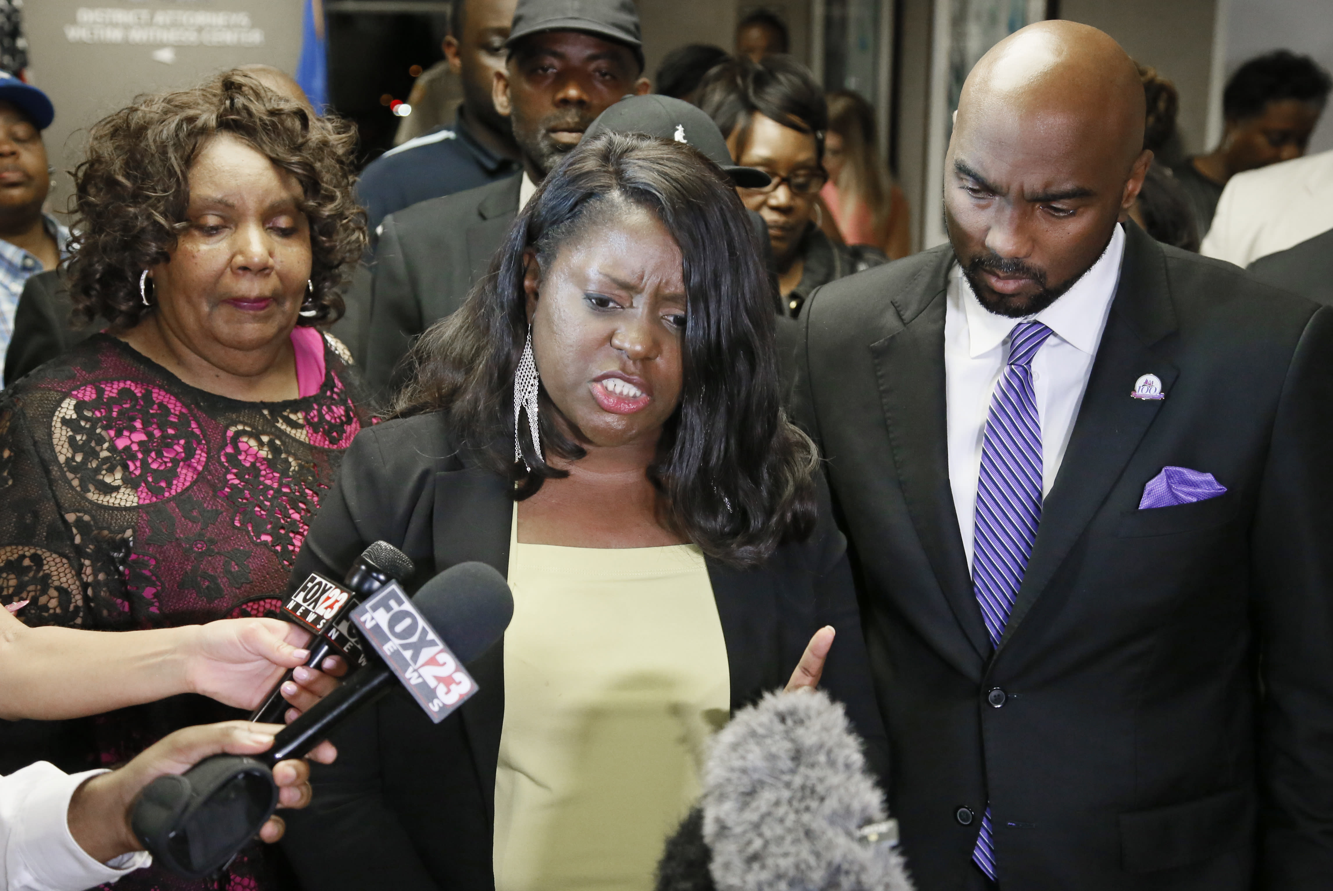 The Latest: Family: Acquitted cop should not return to work