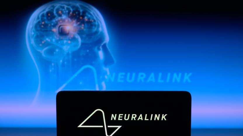 The Neuralink logo is displayed on a smartphone with Neuralink visible in the background in this photo illustration in Brussels, Belgium, on January 30, 2024. (Photo by Jonathan Raa/NurPhoto via Getty Images)