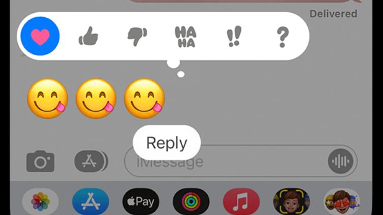 Tapback reactions on Apple's Messages app, with the heart option highlighted.