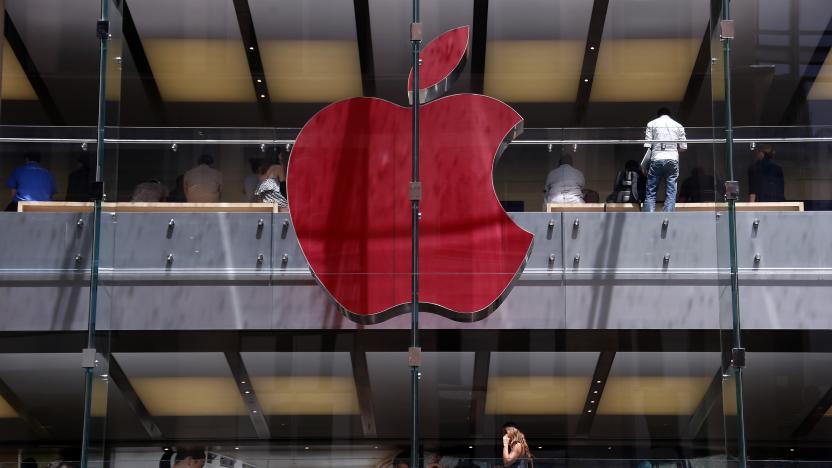 The Apple logo on display at the Sydney Apple Store is illuminated in red to mark World AIDS Day, in Sydney December 1, 2014. Apple stores across the world will display similar colored logos, with the Sydney store being the first. World AIDS Day is observed annually on December 1, which helps to raise awareness about AIDS and the spread of HIV.      REUTERS/David Gray      (AUSTRALIA - Tags: SOCIETY BUSINESS LOGO TPX IMAGES OF THE DAY)