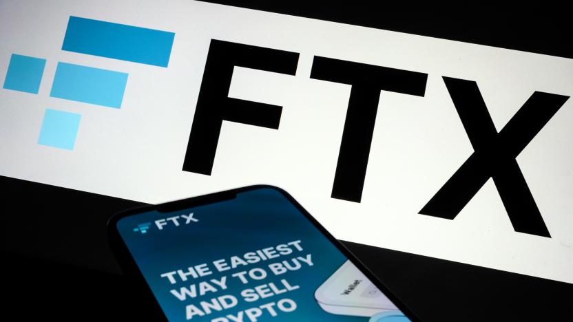 LONDON, ENGLAND - NOVEMBER 10: In this photo illustration the FTX logo and mobile app adverts are displayed on screens on November 10, 2022 in London, England. The Bahamas-based crypto exchange's larger rival, Binance, walked away from a potential bailout deal, as FTX struggles with a wave of customer withdrawals that have created a liquidity crunch. (Photo Illustration by Leon Neal/Getty Images)