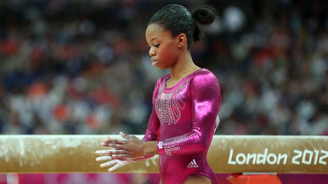 Can Gabby or Aly score gold on the balance beam?