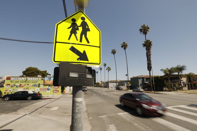 Op-Ed: L.A. invented jaywalking tickets to serve cars. It's time to give streets back to walkers
