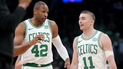 Getty Images - Boston, MA - May 21: Boston Celtics center Al Horford talks to guard Payton Pritchard in the first quarter of Game 1 of the 2024 Eastern Conference Finals. (Photo by Barry Chin/The Boston Globe via Getty Images)