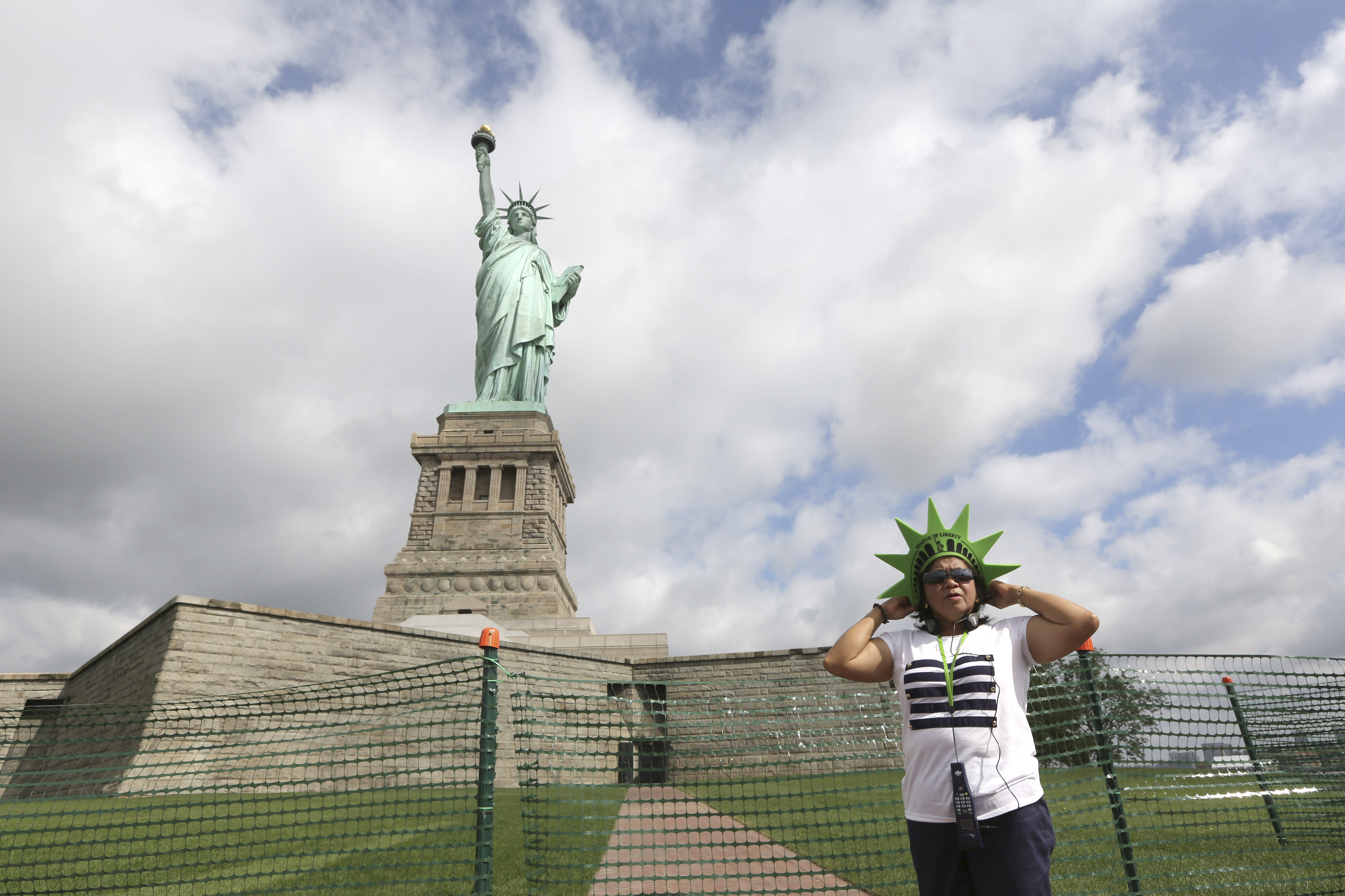 Statue of Liberty reopens as US salutes July 4th
