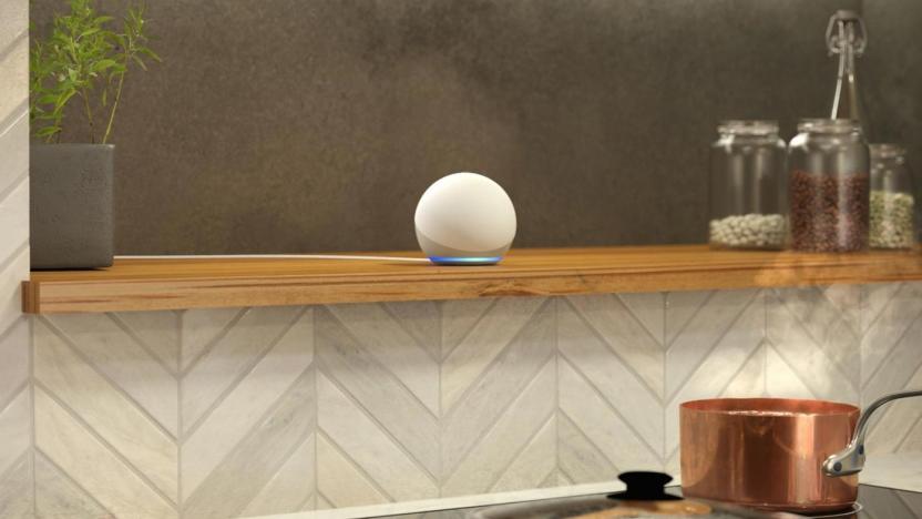 Amazon's Echo Dot smart speaker on a kitchen shelf.