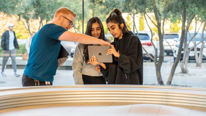 CUPERTINO, UNITED STATES - 2020/02/23: Customers use an iPad for an augmented reality (AR) tour to see a virtual version of the Apple Park campus at the Apple Park Visitor Center in Cupertino. (Photo by Alex Tai/SOPA Images/LightRocket via Getty Images)