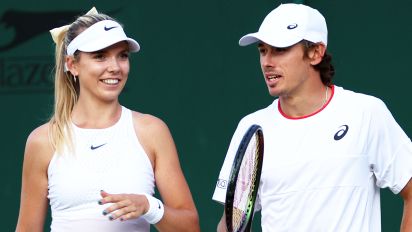 Getty Images - LONDON, ENGLAND - JULY 07: Katie Boulter of Great Britain and partner Alex De Minaur of Australia interact against John Peers of Australia and partner Storm Hunter of Australia in the Mixed Doubles First Round match during day five of The Championships Wimbledon 2023 at All England Lawn Tennis and Croquet Club on July 07, 2023 in London, England. (Photo by Clive Brunskill/Getty Images)