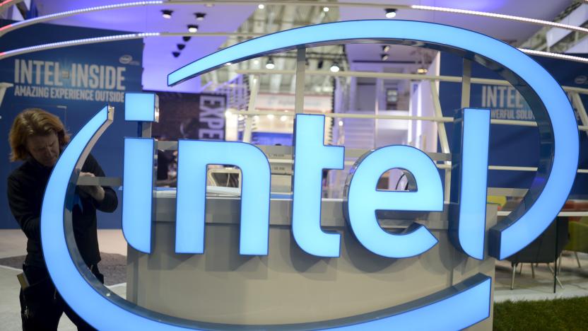 A worker arranges an Intel logo at the CeBIT trade fair, the world's biggest computer and software fair, in Hannover in this March 13, 2016, file photo.  REUTERS/Nigel Treblin/Files  GLOBAL BUSINESS WEEK AHEAD PACKAGE - SEARCH 'BUSINESS WEEK AHEAD APRIL 18'  FOR ALL IMAGES