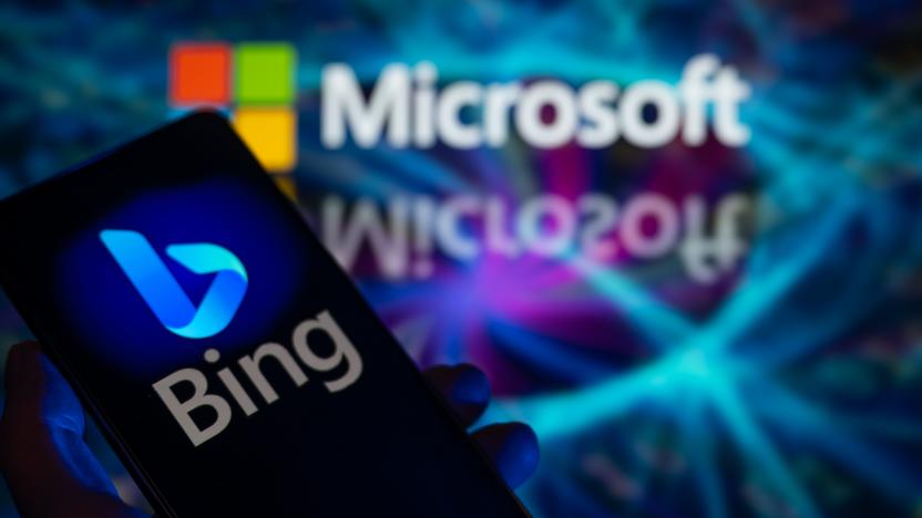 A smart phone is displaying Bing with Microsoft visible in the background in this photo illustration in Brussels, Belgium, on December 30, 2023. (Photo by Jonathan Raa/NurPhoto via Getty Images)