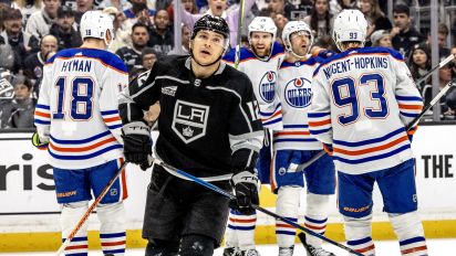 Getty Images - LOS ANGELES, CA - APRIL 28, 2024: Los Angeles Kings left wing Trevor Moore (12) skates away as the Edmonton Oilers celebrate Edmonton Oilers defenseman Evan Bouchard (2) goal during a power play in the second period during Game 4 of the first round of the Stanley Cup playoffs at Crypto.com Arena on April 28, 2024 in Los Angeles, CA.(Gina Ferazzi / Los Angeles Times via Getty Images)