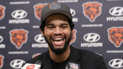 Associated Press - Chicago Bears No. 1 draft pick quarterback Caleb Williams smiles as he listens to reporters during an NFL football news conference in Lake Forest, Ill., Friday, April 26, 2024. (AP Photo/Nam Y. Huh)