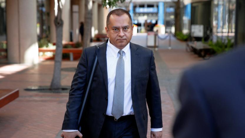 Ramesh "Sunny" Balwani, former president and chief operating officer (COO) of Theranos and ex-boyfriend of founder Elizabeth Holmes, leaves after the opening day of his federal trial for wire fraud and conspiracy to commit wire fraud was postponed due to coronavirus disease (COVID-19) exposure in the courtroom in San Jose, California, U.S. March 16, 2022.  REUTERS/Brittany Hosea-Small