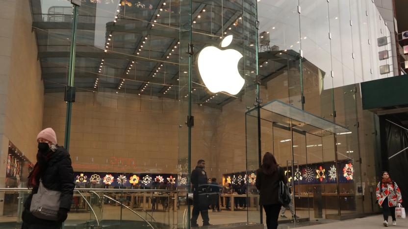 NEW YORK, NY - JANUARY 10: People walk along Broadway in front of the Apple retail store on January 10, 2023, in New York City.  (Photo by Gary Hershorn/Getty Images)