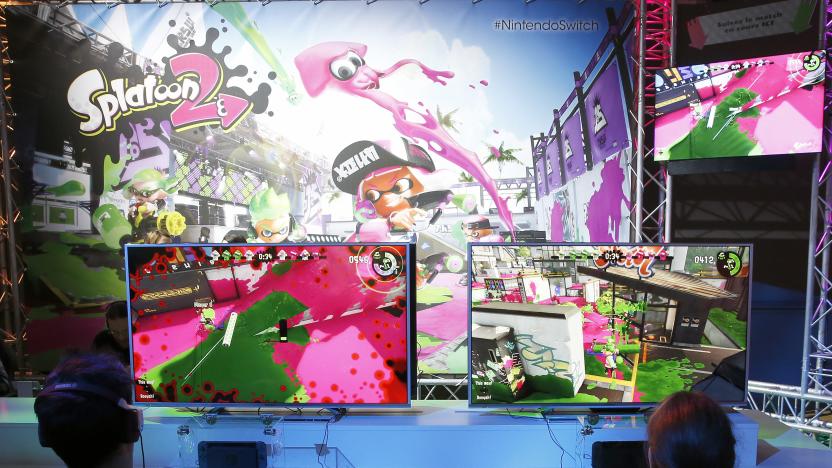 PARIS, FRANCE - JANUARY 13:  Visitors play the "Splatoon 2" video game on a Nintendo Switch games console during the new console's unveiling by Nintendo Co on January 13, 2017 in Paris, France. This next-generation game console, billed as a combination of a home device experience and a portable entertainment system, will be available for $ 299.99 in the US from March.  (Photo by Chesnot/Getty Images)